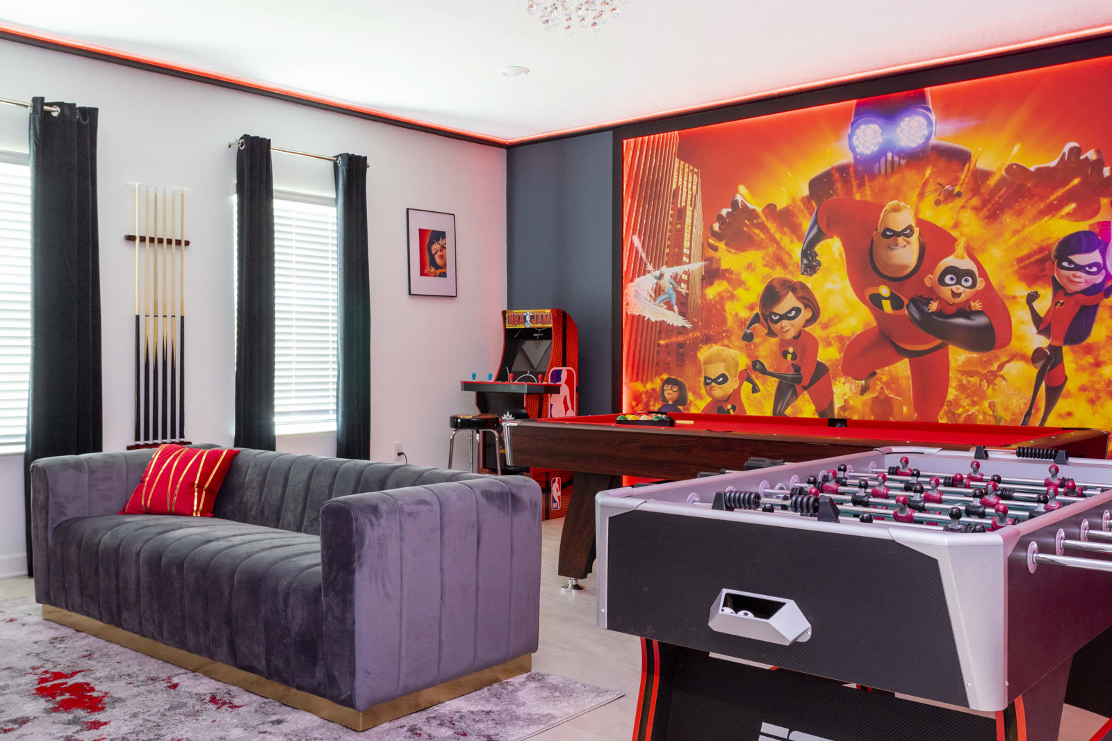 Incredibles game room with pool table, foosball, and basketball arcade